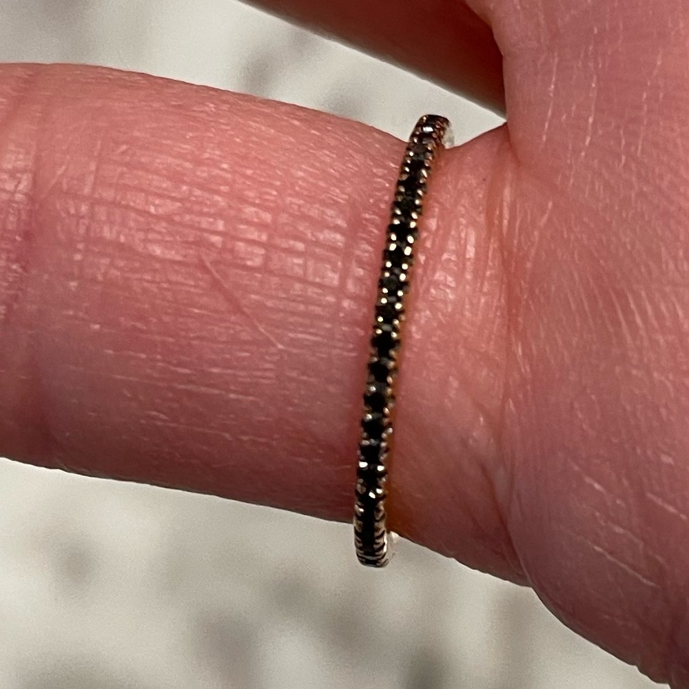 14 karat rose gold band mounted ring with black diamonds